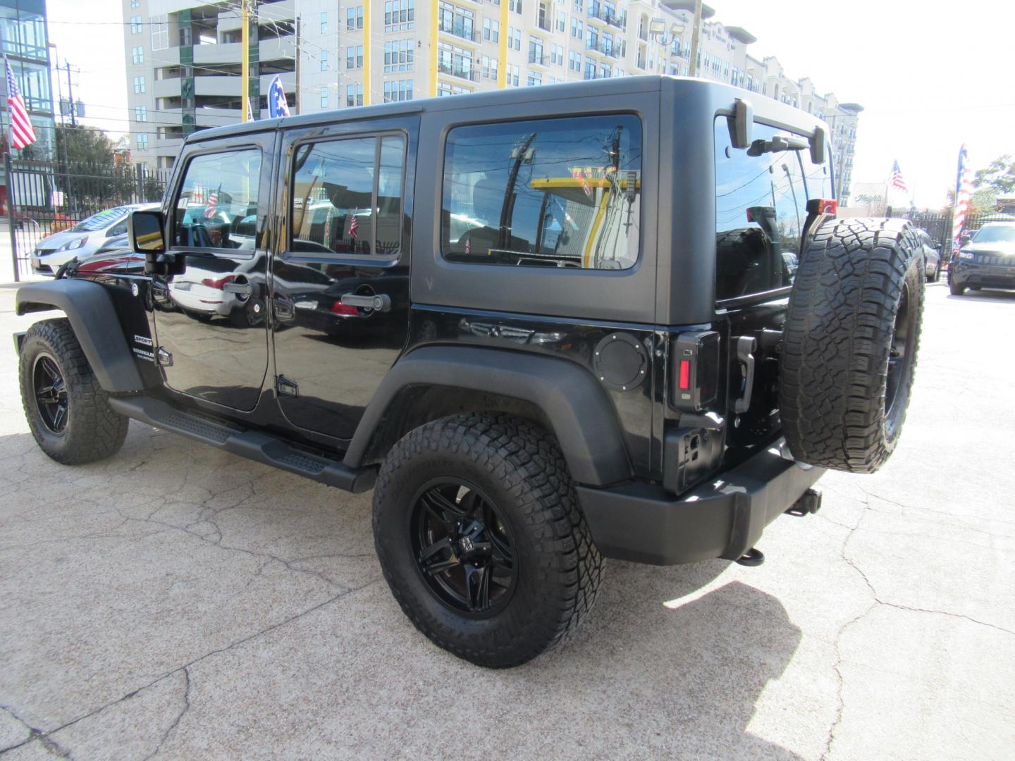 2017 Black /Black Jeep Wrangler UNLIMITED SPORT (1C4BJWDG1HL) with an 3.6L V6 F DOHC 24V engine, Automatic transmission, located at 1511 North Shepherd Dr., Houston, TX, 77008, (281) 657-1221, 29.798361, -95.412560 - 2017 JEEP WRANGLER UNLIMITED SPORT VIN: 1C4BJWDG1HL517754 1 C 4 B J W D G 1 H L 5 1 7 7 5 4 4 DOOR WAGON/SPORT UTILITY 3.6L V6 F DOHC 24V GASOLINE REAR WHEEL DRIVE W/ 4X4 - Photo#35